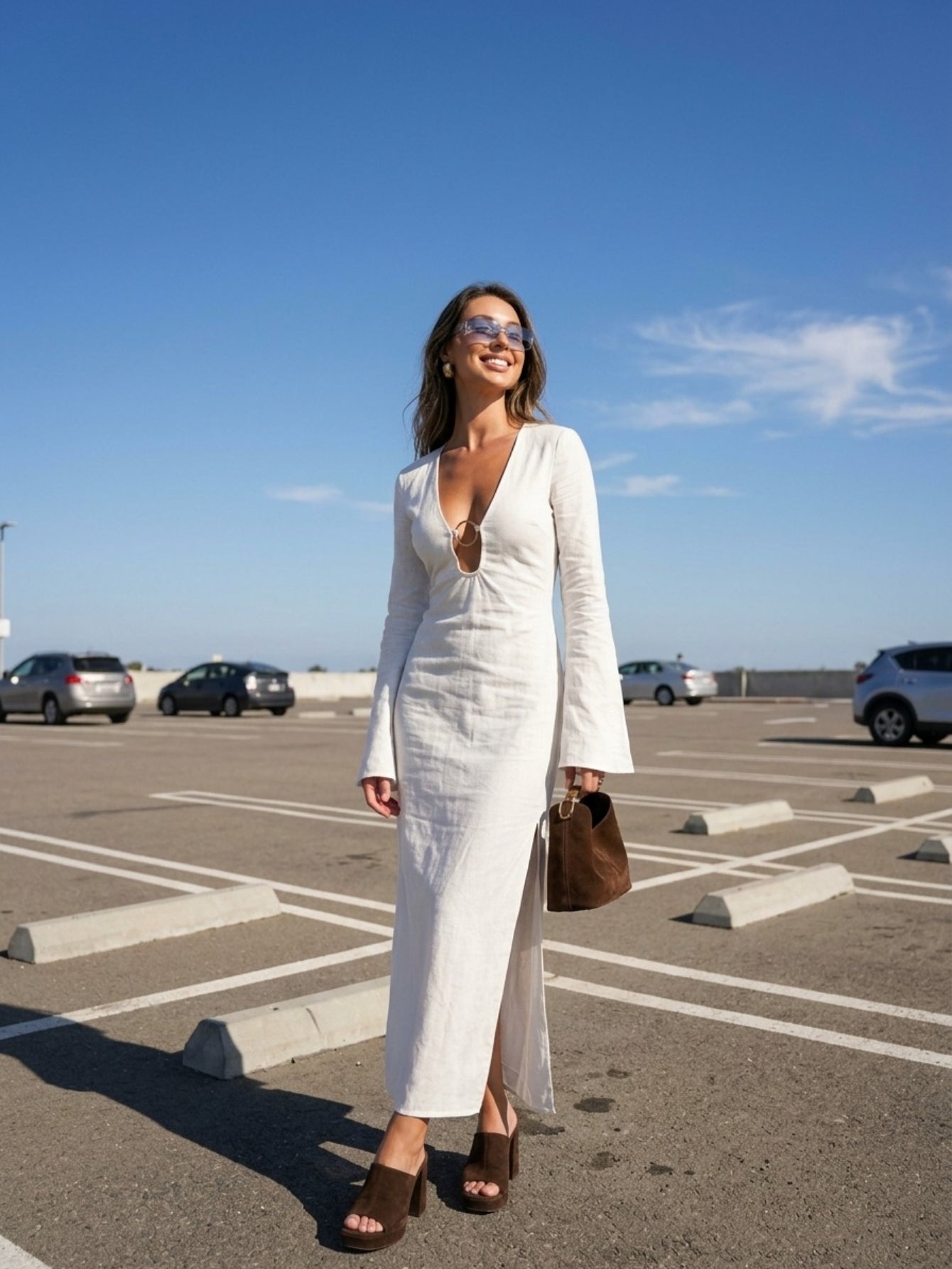 Women's White Maxi Dress - Long Sleeve Plunging Neckline Dress with Ring Detail & Thigh High Slit | Elegant Evening Gown